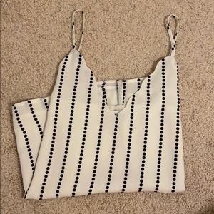 Strapping back and white blouse